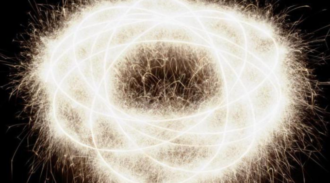 gambar abstrak dari elektron berputar