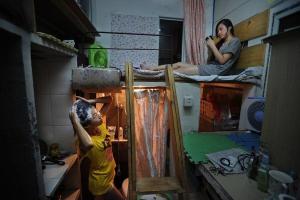 Kapsul apartemen di China, atau bagaimana untuk bertahan hidup dalam sebuah kotak dari bawah lemari es